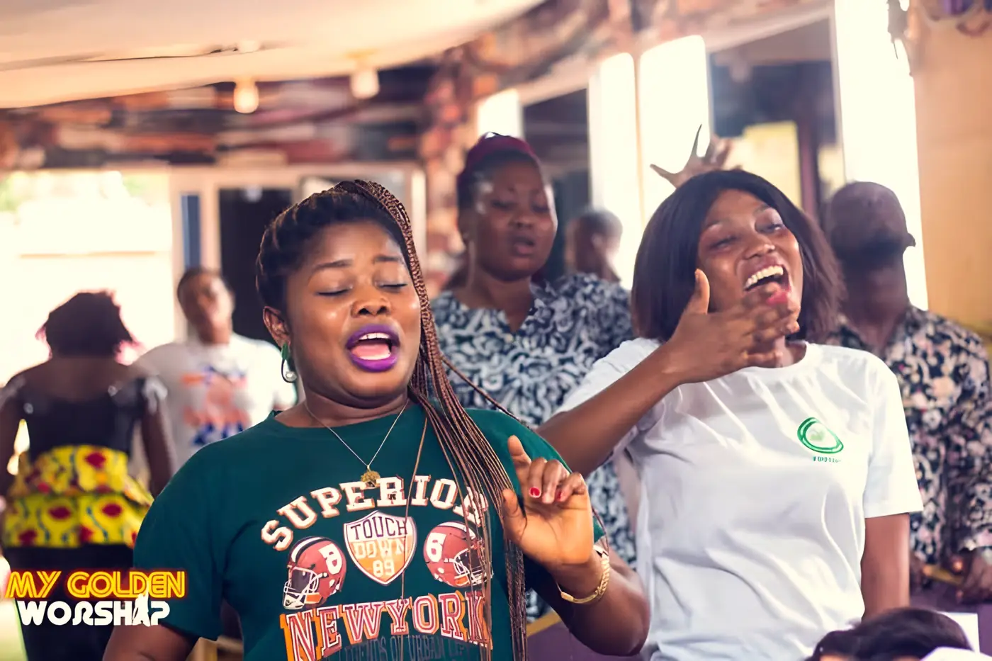 Young women laughing together at a BYM gathering